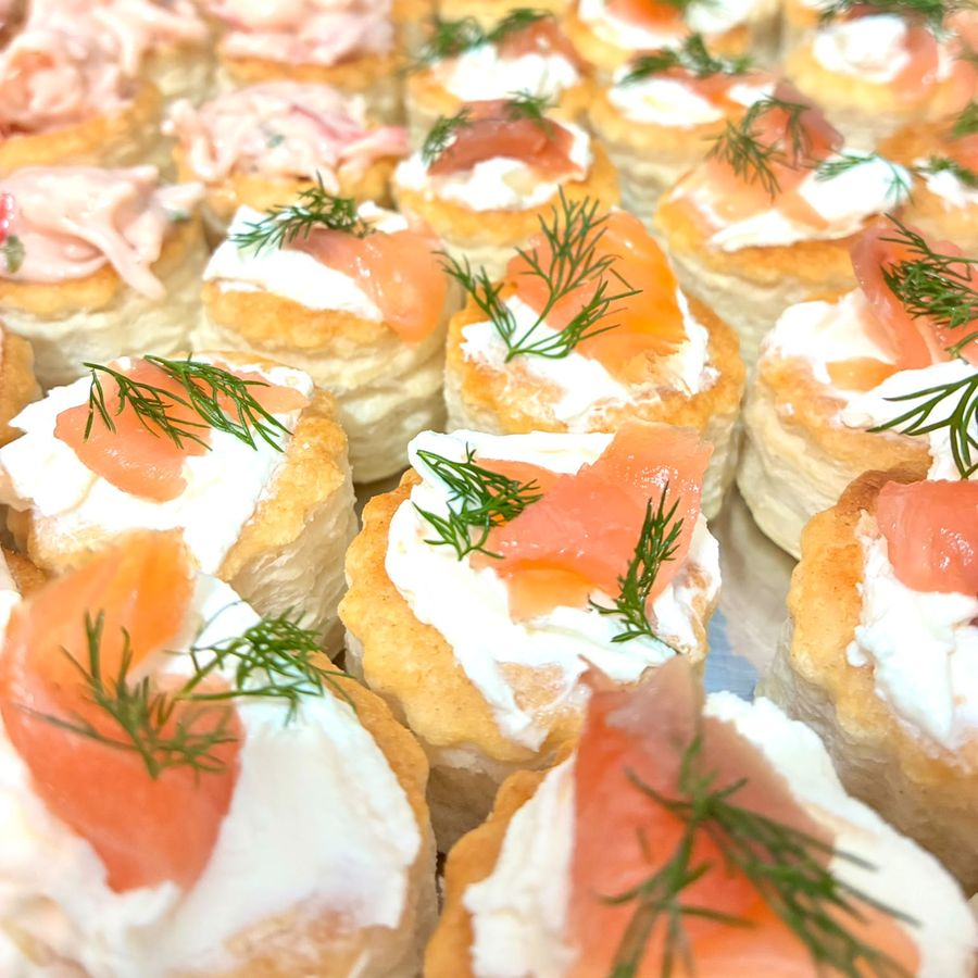 Smoked salmon and cream cheese vol-au-vents topped with dill